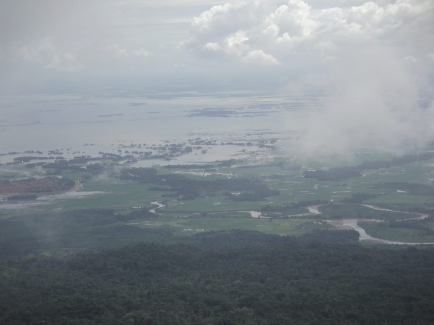 The monsoon-flooded plains of Bangladesh seen from Thangkharang Park, a silver inland sea